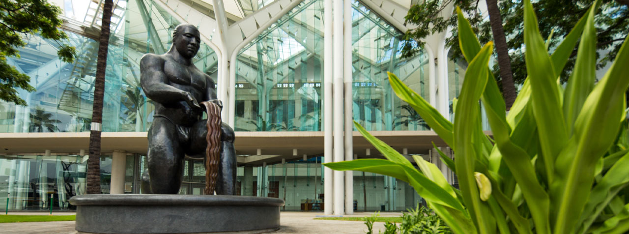 The Hawaii Tourism Authority bronze statue symbolically acknowledges the Hawaiian people for their generosity and expressions of goodwill to newcomers.